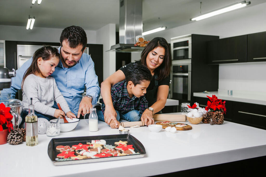 Making Christmas Cookies on Quartz countertops in kitchen